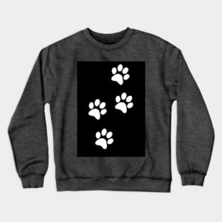 White Paw-prints on a black surface Crewneck Sweatshirt